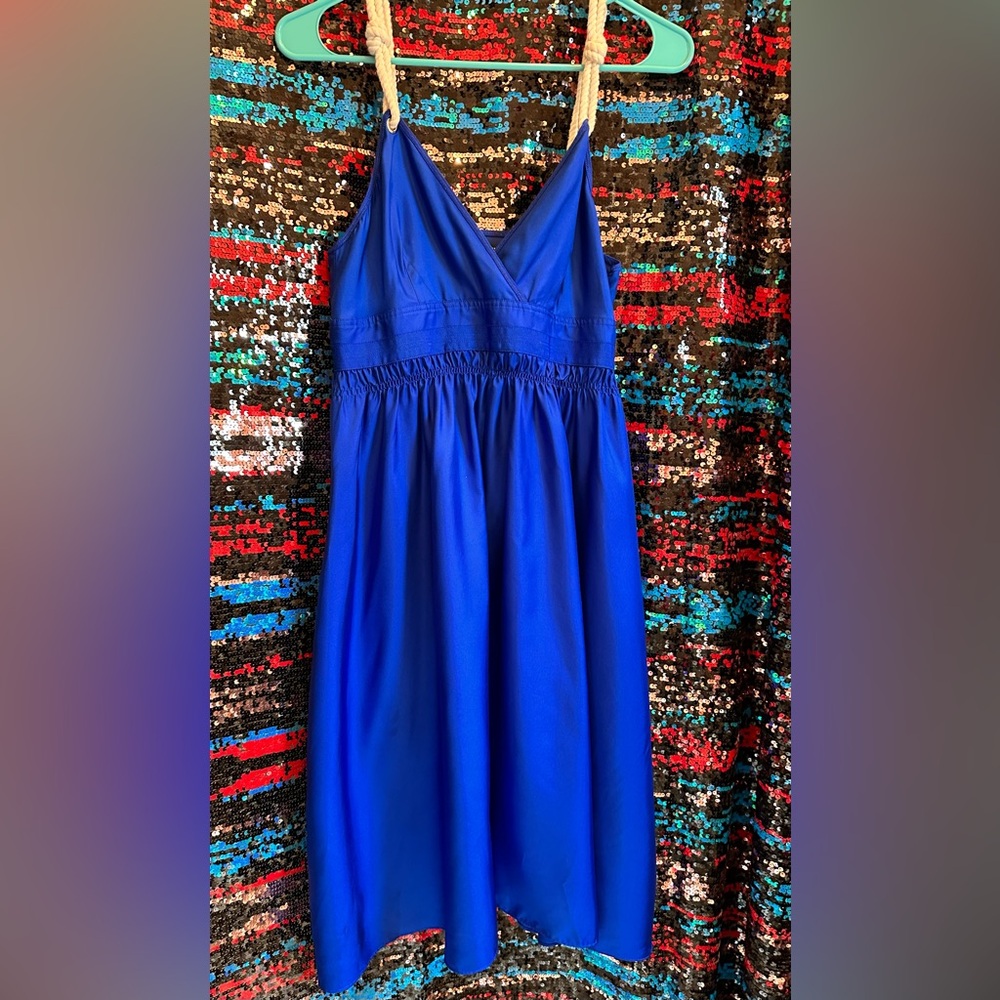 Bold blue silk dress with rope detailing. Great movement!